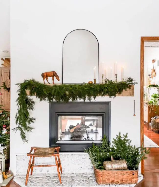 Candlelit Greenery for an Elegant Mantel