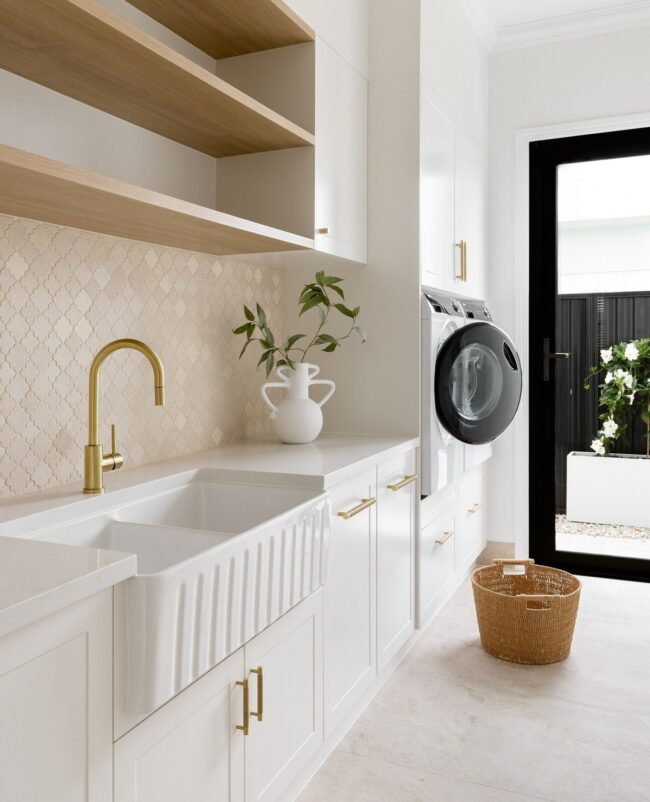 Elegant Laundry with Gold and Shelving