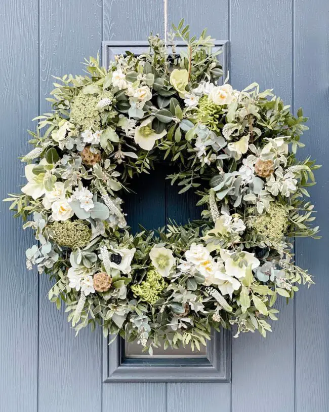 Charming Green Wreath with White Blooms