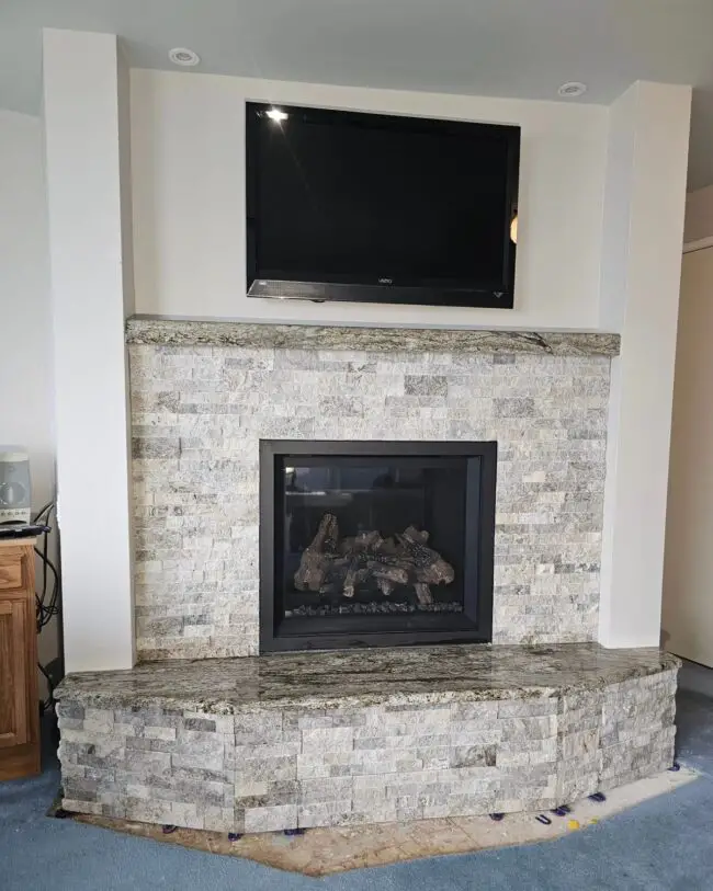 Stacked Stone Fireplace with Above TV