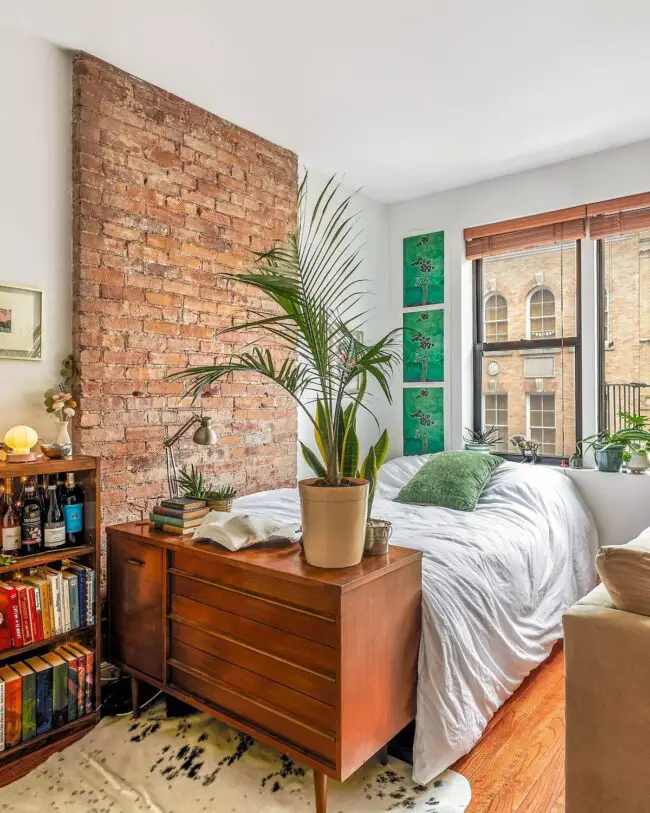 Urban Bedroom with Industrial and Greenery Details