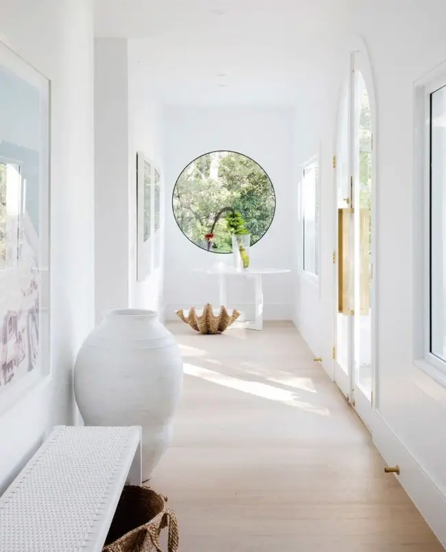 Bright Hallway with Round Window