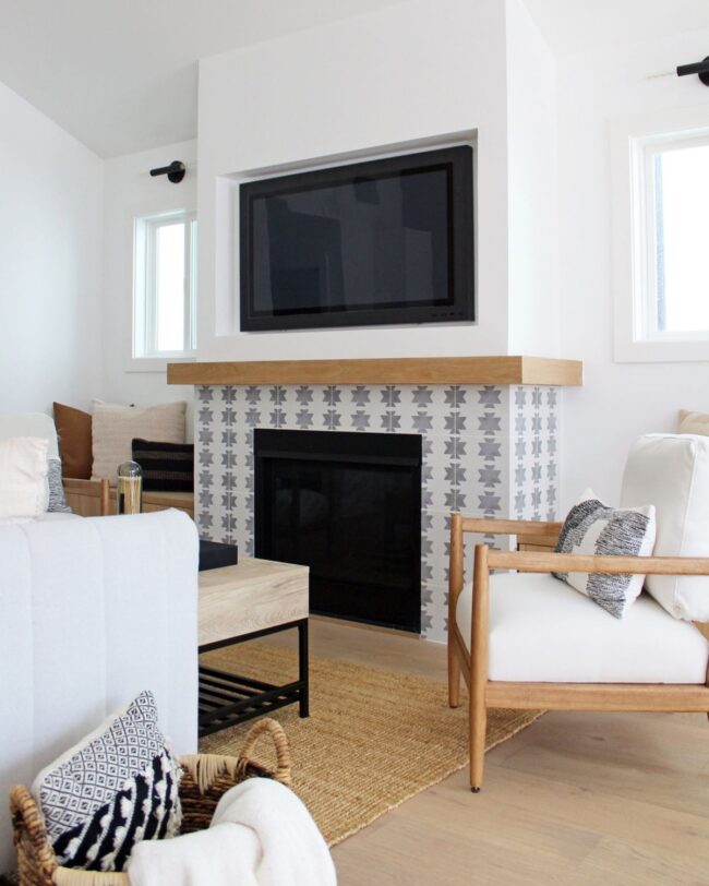 Gray and White Geometric Tiles with Wooden Mantel