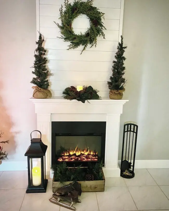 Evergreen Accents on a Simple Rustic Mantel