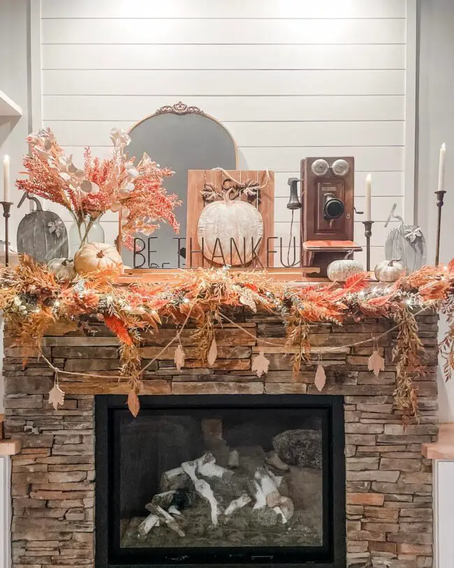 Autumn-Inspired Mantle with Pumpkins and Warm Hues