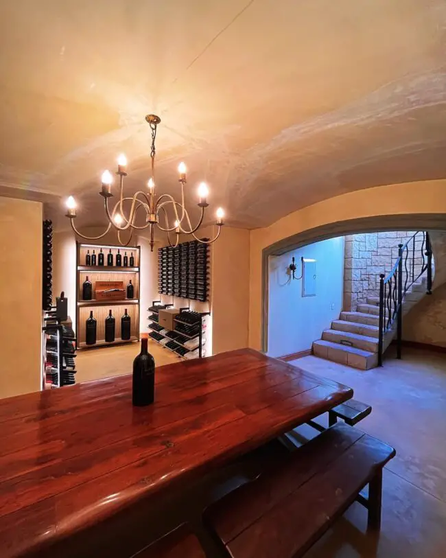 Inviting Wine Cellar with a Chandelier