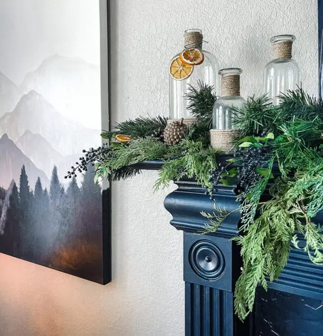 A Clean & Elegant Mantel with Greenery